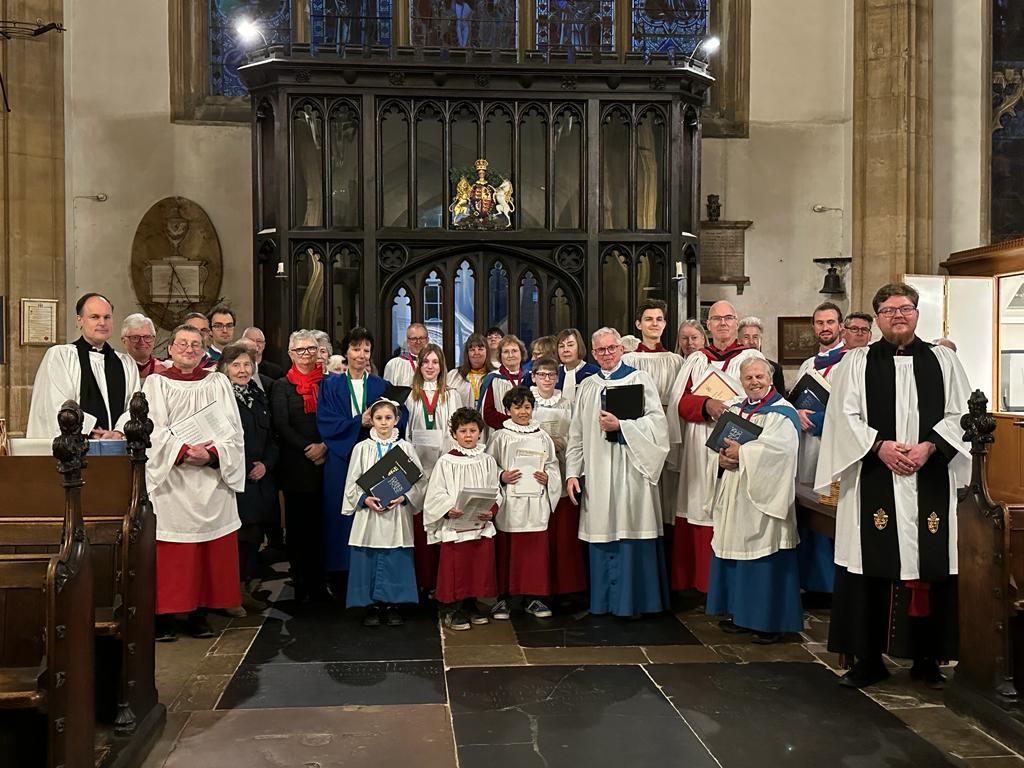 St John's and St Mary's Church Choirs together inside St Mary's Bury St Edmunds